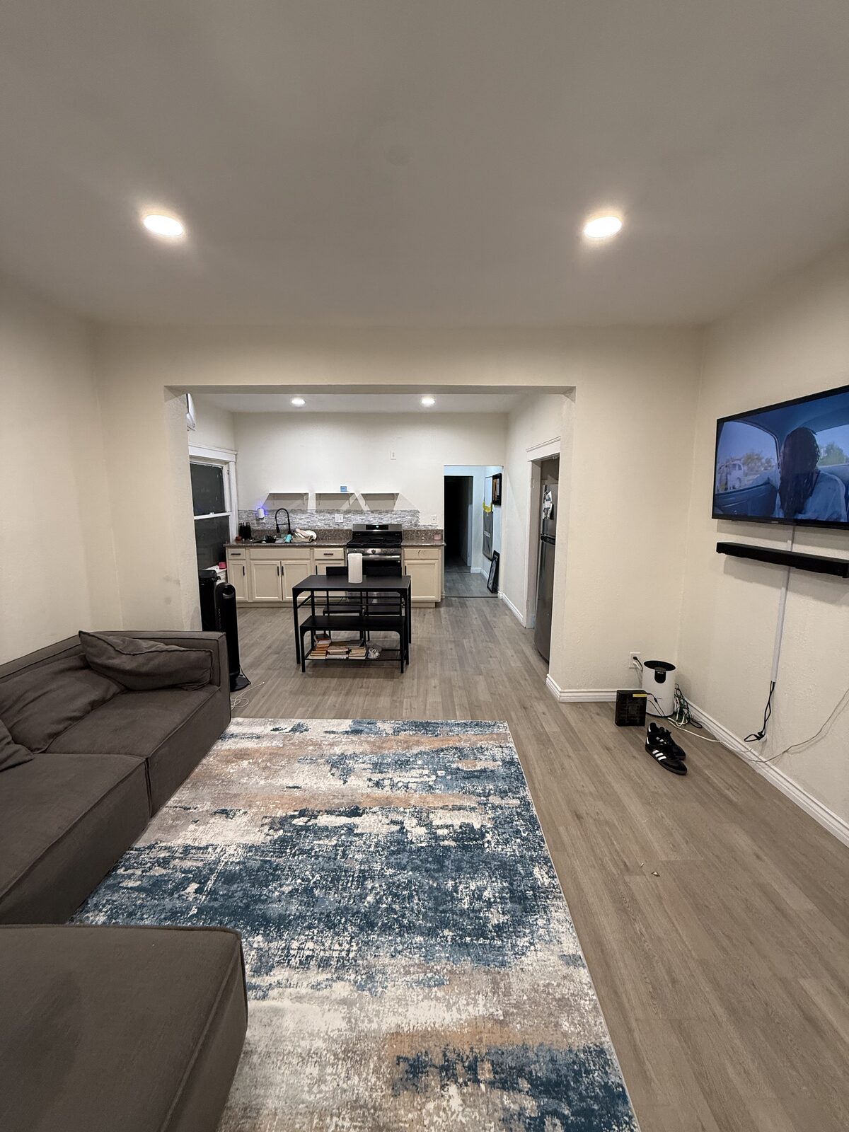 Unit A living room and kitchen after renovation