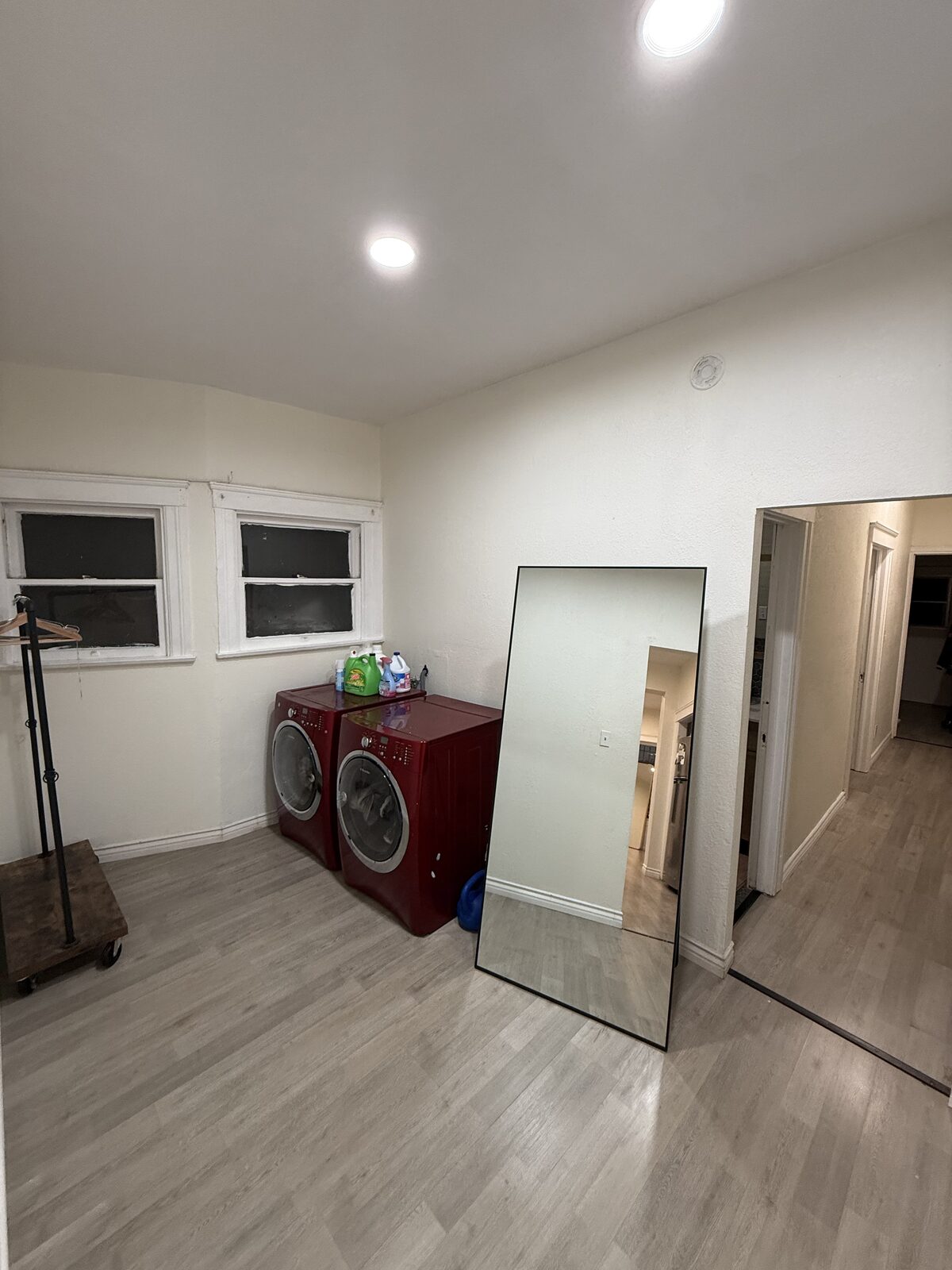 Unit A laundry area with washer and dryer, finished